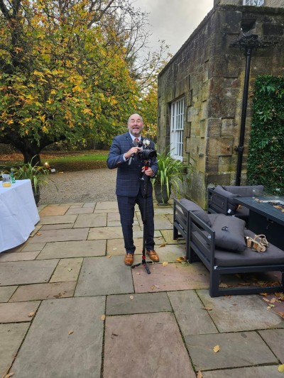 Martin Simpson on his daughter's wedding day as  he set up cameras to capture the event..JPG
