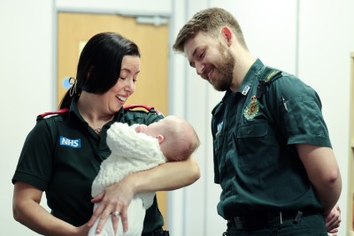 Paramedic Lynsey Bancroft and ambulance support practitioner Tom Little with baby Sebastian.jpg